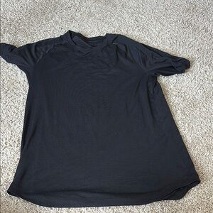 Lululemon Athletica Black Short Sleeve Tee - small hole on back